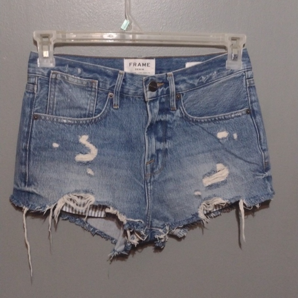Frame Le Stevie Distressed Denim Cutoff Shorts with Peeking Pockets Blue 24